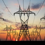 3D Electric powerlines over sunrise